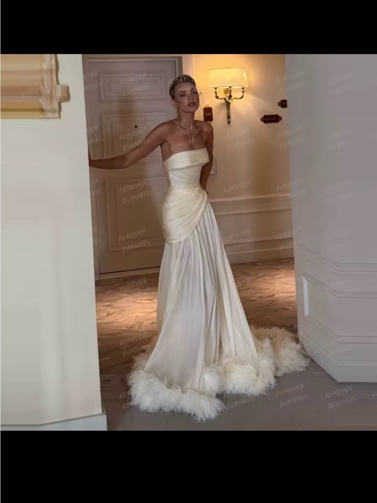 Dresses & Skirts - Strapless White Maxi Gown with Feather Hem